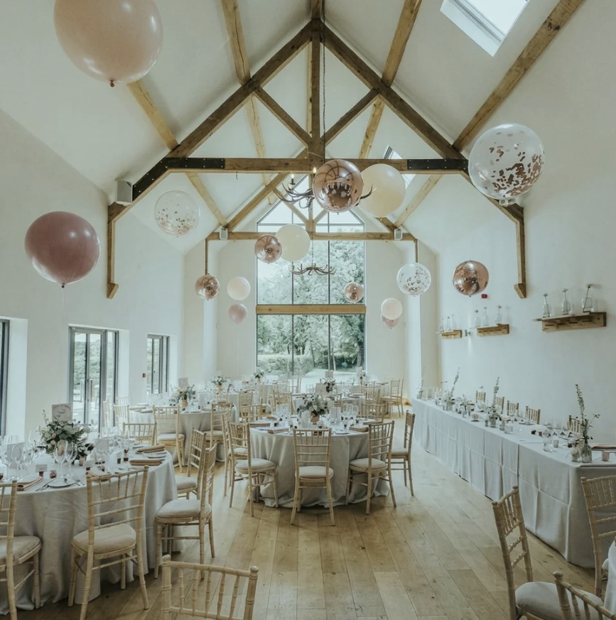 Ceiling balloon installation in a ballroom